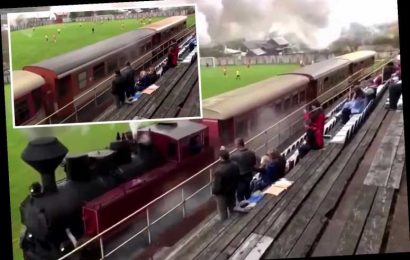 Slovakian team Tatran Cierny Balog have STEAM TRAIN running between pitch and stands that blocks fans' sight