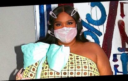 Lizzo Carries a Bedazzled Flask While Arriving at Grammys 2021 After Party