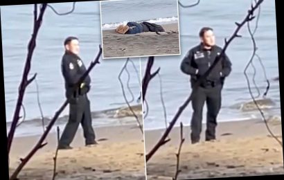 Canadian police accused of posing for photos in front of dead body