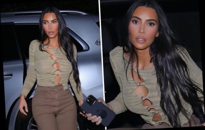 Kim Kardashian ditches her bra in see-through top to celebrate billionaire status despite Khloe's unedited photo scandal