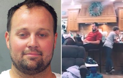 Josh Duggar looks fixated with his laptop at family event in sinister resurfaced video after his child porn arrest