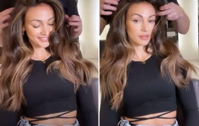 Michelle Keegan flashes her incredible abs as she shows off her glamorous new hair