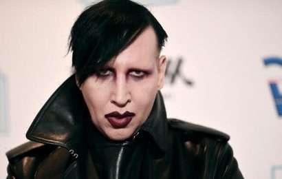 Marilyn Manson to turn himself in on arrest warrant over assault charges