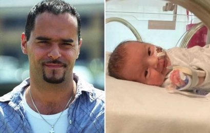 EastEnders star Michael Greco reveals his newborn son is still in intensive care and 'fighting to live a normal life'