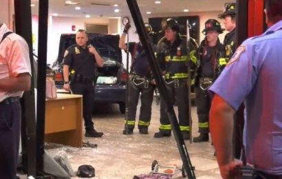 Woman at large after plowing car through hotel-turned-homeless shelter, 3 injured