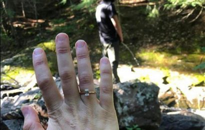 Bride-to-be shows off her new engagement ring – but it's what her groom is doing that has people talking