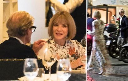 EXC: Bill Nighy presents Anna Wintour with red roses at dinner in Rome