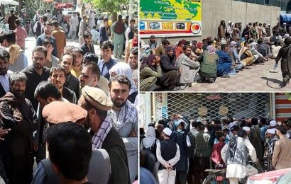 Taliban beat Afghans gathered outside  bank amid cash crisis