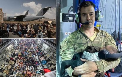 RAF sergeant cradled newborn Afghan baby on last flight out of Kabul