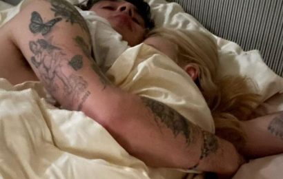 Brooklyn Beckham's fiancée Nicola Peltz shares intimate pic of them together in bed – taken by her MUM as they slept