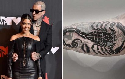Travis Barker gets Kourtney Kardashian's LIPS tattooed on his arm as he covers up old ink dedicated to ex Shanna Moakler