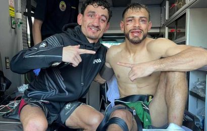 Battered UFC rivals Max Holloway and Yair Rodriguez pose for photos inside AMBULANCE after ‘one of the best fights ever’