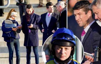 Banned jockey Robbie Dunne watches the racing at Cheltenham the day after losing his licence for bullying Bryony Frost