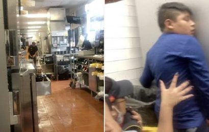McDonald&apos;s staff cower in kitchen during police stand-off with gunman