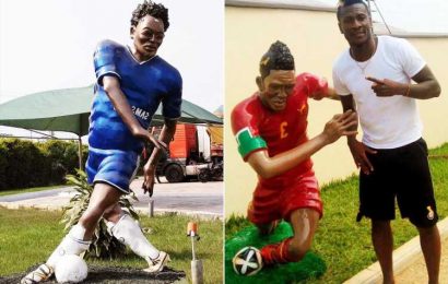 Asamoah Gyan poses beside bizarre statue… produced by same sculptor who made tribute to Michael Essien