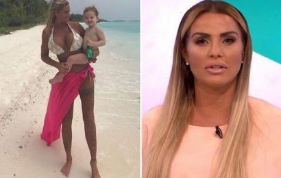 Katie Price hits out at trolls who claim she's 'not a real woman' after so much plastic surgery, insisting she's 'proud of her body – scars and all'