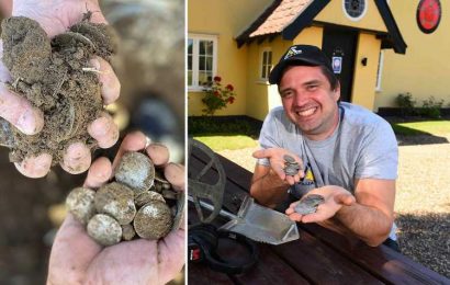 Metal detectorist unearths staggering £100,000 silver coin hoard in field behind his local pub