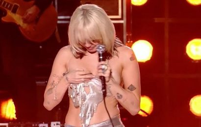 Miley Cyrus Kicked Off 2022 by *Expertly* Handling a Wardrobe Malfunction on Live TV