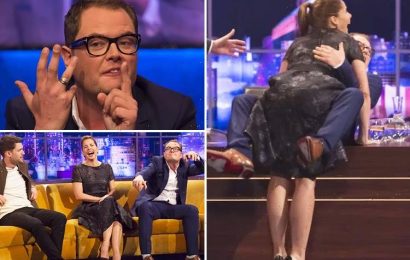 Strictly's Darcey Bussell MOUNTS Alan Carr across a desk as he shows off his ring on Jonathan Ross show
