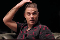 Take That reveal never-before-seen video of wild partying that left Robbie Williams with nasty head injury in new documentary