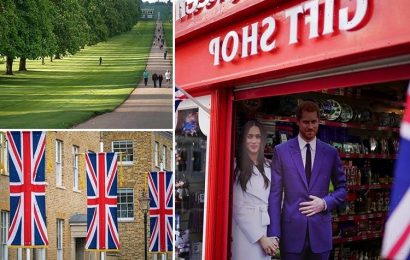 Windsor gets ready for royal wedding with bunting and flags as Meghan Markle and Prince Harry 'spotted' around town