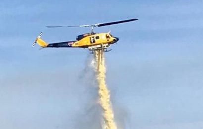 Pilot dies in helicopter crash while fighting Tasmanian bushfires