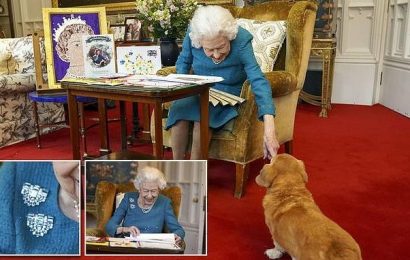 Queen views a display of memorabilia at Windsor Castle