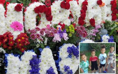 Tearful funeral for four twins, 3 and 4, killed in horror fire as flowers left at 'beautiful' service