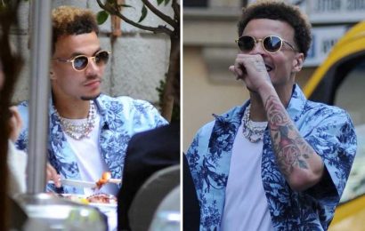 Dele Alli enjoys welcome break from Everton woes as he stops for lunch in Milan wearing Hawaiian shirt and chains