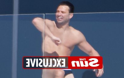 Mark Wright strips to his pants to jump in the pool at luxury LA villa with Michelle Keegan