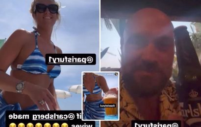 Tyson Fury enjoys his retirement on holiday as he refuses to lift finger as wife Paris does work and passes him beers