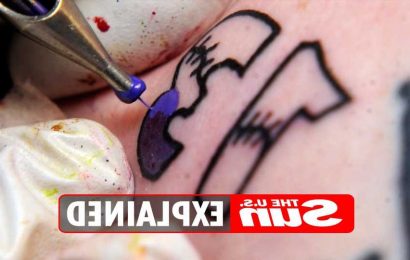 What is a Friday the 13th tattoo and where did the tradition come from?