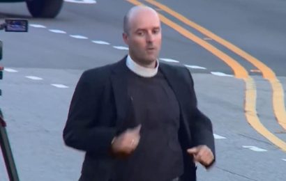 Heartbreaking picture shows priest running away after gunman killed two and hurt another at church potluck dinner | The Sun