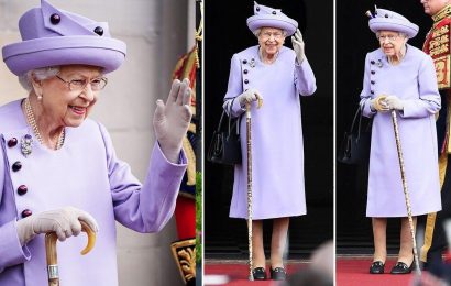 Queen Elizabeth pays tribute to Scotland with lilac outfit and thistle brooch in Edinburgh