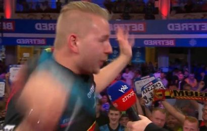 Dimi Van den Bergh almost breaks microphone screaming as he beats Peter Wright