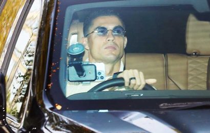 Cristiano Ronaldo looks glum as benched striker drives in for Man Utd training day after derby thrashing to City | The Sun