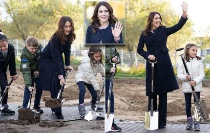 Crown Princess Mary spotted shovelling dirt while wearing heels