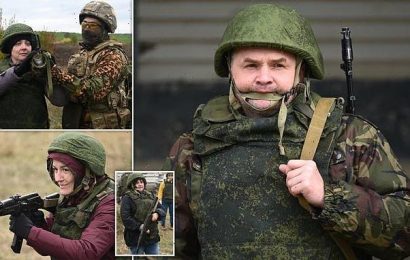 New photos show unassuming Russians posing with assault rifles