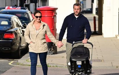 Sam Faiers and Paul Knightley look loved-up as they hold hands on stroll with baby Edward