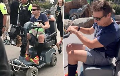 Jeremy Renner tours Six Flags on scooter after snowplow accident