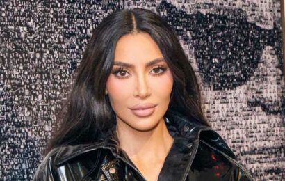 Kim Kardashian looks completely unrecognizable before 'plastic surgery makeover' after star shares rare throwback photo | The Sun