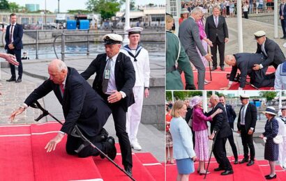 Norway&apos;s King Harald falls on the red carpet as he arrives in Denmark