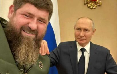 Pic of 'waxwork' Putin posing with Chechen warlord and bizarre video of him kissing child spark more body double rumours | The Sun