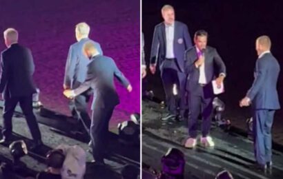 Awkward moment David Beckham almost slips over during Messi's Inter Miami presentation.. before he's taunted by co-owner | The Sun