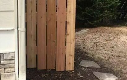 Homeowner takes revenge after neighbour's complaint with world's smallest privacy fence – & it has a VERY clear message | The Sun