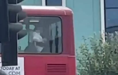Shocking moment couple 'have sex on top deck of double decker bus' in front of members of the public | The Sun