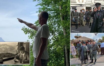 Leader of &apos;SS group&apos; pictured performing Nazi salute