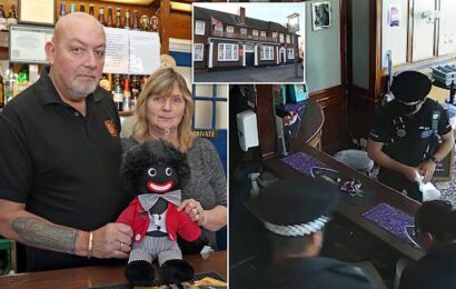 Police who removed pub golliwogs say owners face no further action