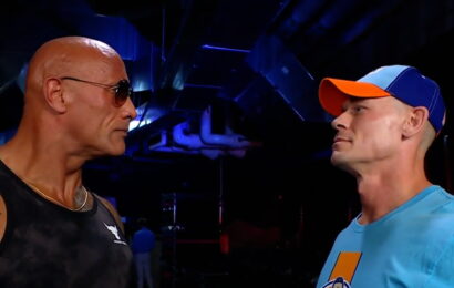 The Rock comes face to face with John Cena in surprise WWE return