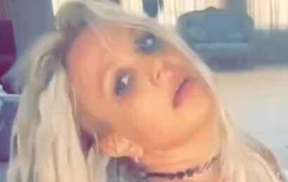 Britney Spears holds knife against her own throat as she dances in bikini at home after revealing heartbreaking abortion | The Sun